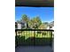 Enjoy a serene view of the community's lush landscaping and pond from your private balcony at 1916 Lake Atriums Cir # 46, Orlando, FL 32839