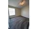 Simple bedroom with carpet and a window at 1916 Lake Atriums Cir # 46, Orlando, FL 32839