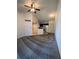 Spacious living room with carpet and a ceiling fan at 1916 Lake Atriums Cir # 46, Orlando, FL 32839