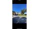 Exterior view of an apartment building with parking at 1916 Lake Atriums Cir # 46, Orlando, FL 32839