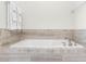 Relaxing bathroom featuring a luxurious soaking tub at 280 Pendant Ct, Kissimmee, FL 34747