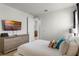 Comfortable bedroom with a queen-size bed and en-suite bathroom access at 280 Pendant Ct, Kissimmee, FL 34747