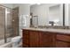 Bathroom with granite vanity and walk-in shower at 280 Pendant Ct, Kissimmee, FL 34747