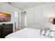 Primary bedroom with plush bed and access to bathroom at 280 Pendant Ct, Kissimmee, FL 34747