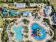 Large pool and waterpark with various slides and water features at 280 Pendant Ct, Kissimmee, FL 34747