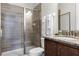 Modern bathroom with shower and granite vanity at 280 Pendant Ct, Kissimmee, FL 34747