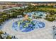 Aerial view of a whimsical splash pad with slides and water features at 280 Pendant Ct, Kissimmee, FL 34747