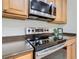 Stainless steel appliances in a well-lit kitchen setting at 722 Coronado Dr, Kissimmee, FL 34759