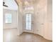 Bright entryway with tile flooring, a glass door, and neutral colors at 722 Coronado Dr, Kissimmee, FL 34759