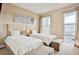 Twin bedroom with two beds and plenty of natural light at 3213 Brasilia Ave, Kissimmee, FL 34747