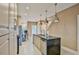 Modern kitchen with stainless steel appliances and granite island at 3213 Brasilia Ave, Kissimmee, FL 34747