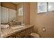 Well-appointed bathroom with granite vanity and modern fixtures at 3213 Brasilia Ave, Kissimmee, FL 34747