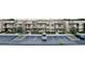 Modern townhome community with parking and landscaping at 3213 Brasilia Ave, Kissimmee, FL 34747