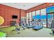 Modern fitness center with treadmills, ellipticals, and weights at 3213 Brasilia Ave, Kissimmee, FL 34747