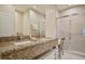Modern bathroom with double vanity and walk-in shower at 3213 Brasilia Ave, Kissimmee, FL 34747
