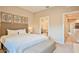 King-size bed, en-suite bathroom access at 3213 Brasilia Ave, Kissimmee, FL 34747