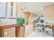 Bright dining area with view of kitchen and staircase at 3213 Brasilia Ave, Kissimmee, FL 34747
