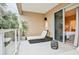 Balcony with lounge chair and view into bedroom at 3213 Brasilia Ave, Kissimmee, FL 34747