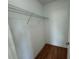Walk-in closet with wire shelving for convenient storage at 1204 Vero Beach Way, Poinciana, FL 34759
