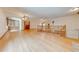 Spacious loft area with hardwood floors and built-in shelving at 1775 Sundance Dr, St Cloud, FL 34771