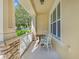 Front porch with sitting area and view of street at 2917 Windmill Dr, Kissimmee, FL 34741