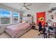 Charming bedroom with a fun and playful design, and lots of natural light at 2917 Windmill Dr, Kissimmee, FL 34741
