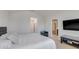 Bright bedroom with ensuite bathroom access and a king-size bed at 2917 Windmill Dr, Kissimmee, FL 34741