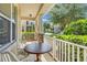 Front porch with sitting area and view of street at 2917 Windmill Dr, Kissimmee, FL 34741