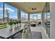 Relaxing screened patio with seating area, perfect for outdoor dining at 510 Summit River Dr, Apopka, FL 32712