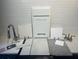 Kitchen design samples with white cabinets, quartz countertops, and gray tile backsplash at 510 Summit River Dr, Apopka, FL 32712