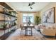 Home office featuring a large desk and comfortable seating area at 2108 Riley Ave, Eagle Lake, FL 33839