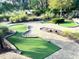 Landscaped mini golf course with alligator feature at 274 Captiva Dr, Davenport, FL 33896