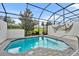 Relaxing screened pool with ample patio space at 274 Captiva Dr, Davenport, FL 33896