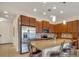Modern kitchen with stainless steel appliances and granite countertops at 274 Captiva Dr, Davenport, FL 33896