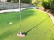 Putting green with a pink putter near the hole at 274 Captiva Dr, Davenport, FL 33896