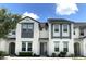 Three-story townhouses with modern design and landscaping at 274 Captiva Dr, Davenport, FL 33896