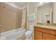 Bathroom with tub, shower, toilet and granite countertop at 274 Captiva Dr, Davenport, FL 33896