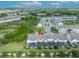 Aerial view showcasing the property and its private pool, surrounded by other homes at 274 Captiva Dr, Davenport, FL 33896