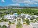 Aerial view of community amenities including pool and clubhouse at 274 Captiva Dr, Davenport, FL 33896