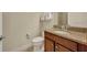 Clean bathroom with granite countertop, toilet and shower at 274 Captiva Dr, Davenport, FL 33896