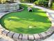 Miniature golf course with log obstacle and two holes at 274 Captiva Dr, Davenport, FL 33896