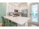 Modern kitchen with white cabinets and stainless steel appliances at 3037 Sea Plane Ln, Kissimmee, FL 34747