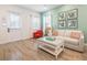 Light and airy living room with a sofa and coffee table near the entrance at 3037 Sea Plane Ln, Kissimmee, FL 34747