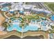 Aerial view of Margaritaville Resort showing multiple pools, buildings, and landscaping at 3037 Sea Plane Ln, Kissimmee, FL 34747