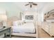 Spacious bedroom with king-size bed and large dresser at 3037 Sea Plane Ln, Kissimmee, FL 34747