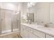 Double vanity bathroom with a large shower and plenty of storage at 3037 Sea Plane Ln, Kissimmee, FL 34747