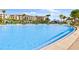 Expansive resort-style pool with a swim-up bar at 3037 Sea Plane Ln, Kissimmee, FL 34747