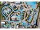 Aerial view of a large water park with lazy river and slides at 3037 Sea Plane Ln, Kissimmee, FL 34747