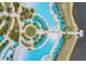 Aerial view of resort pool with multiple pools, umbrellas, and lounge chairs at 3037 Sea Plane Ln, Kissimmee, FL 34747