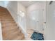 Carpeted staircase with a white railing at 4722 Sleepy Hollow Dr, Kissimmee, FL 34746